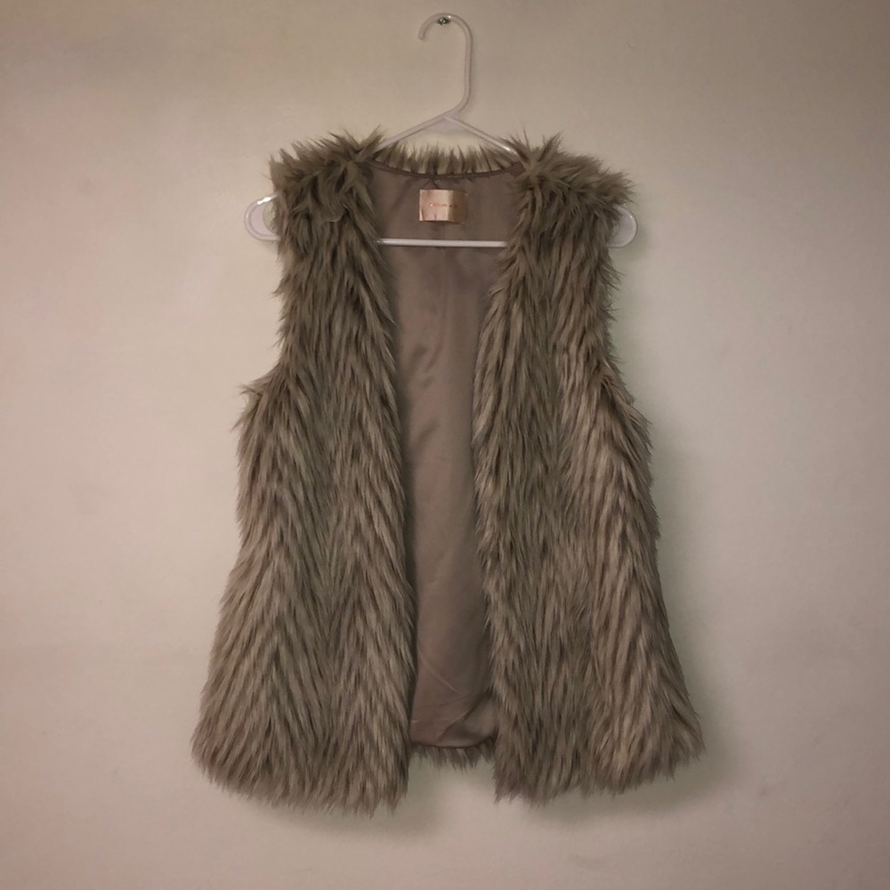 Grey and brown waist length fur vest